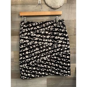 WHBM 2 EUC black floral pencil skirt w/mesh stripes polyester- side zip closure